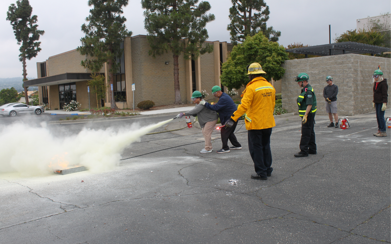 Lomita residents learning how to use a fire extinguisher at CERT training