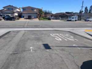 Completed gutter in street at stop sign