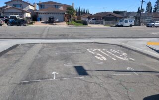 Completed gutter in street at stop sign